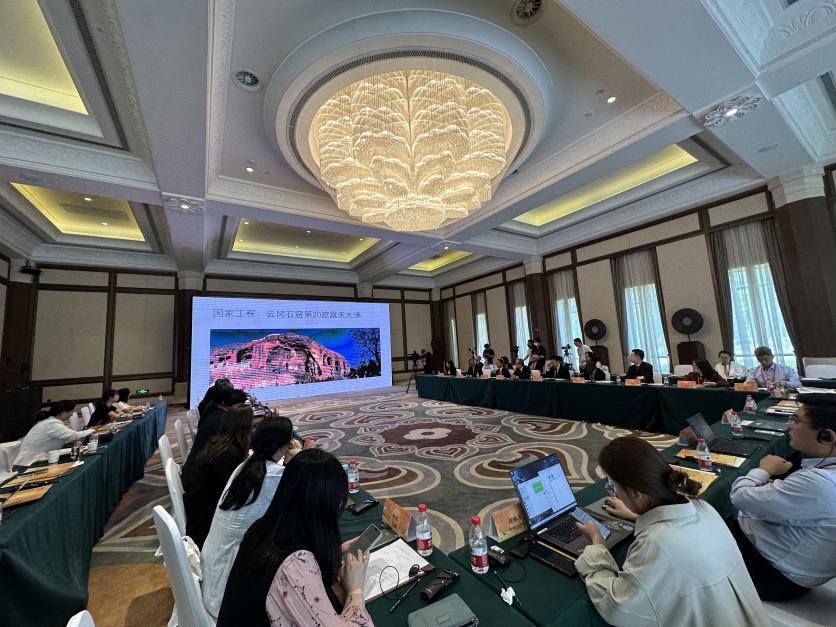 5月30日，“共筑文明共同體——博物館國際合作新愿景”平行論壇在甘肅敦煌舉行。圖為論壇現(xiàn)場。（中新社記者丁思 攝）